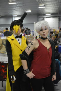 Zoe Seguin (Arctic Werewolf Cosplay) and Elyse Primeau (Shinymaguro) cosplay as Bill Cipher of Gravity Falls and Saeran Choi of Mystic Messenger, respectively.