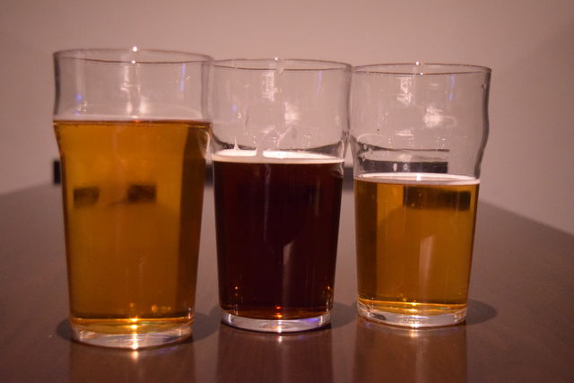Photo of 3 beers lined up. 